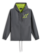 Alpinestars Speeder Chromium vindjacka, mörkgrå med varselgult, limegrön stjärnlogotyp på bröstet, nätfodrad huva, hel dragkedja framtill med dragsko i fållen, avslappnad motorsportinspirerad vindjacka