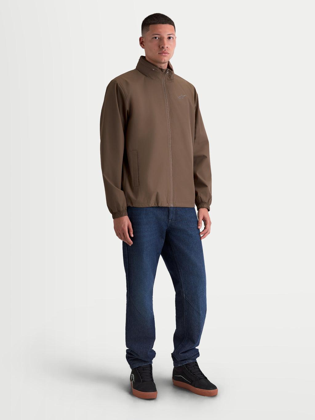 Alpinestars Overhaul Racer Jacket, Men's Lightweight Sportswear Outerwear in Walnut Brown, featuring a Packable Hidden Hood, Mesh Lining, Front Reverse Coil Zipper, and small HD Astars Logo on chest, On-Model View.