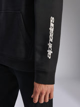 Alpinestars Harken Hoodie, Black, close-up of sleeve featuring vertical white wordmark logo, ribbed cuff and kangaroo pocket detail, casual sportswear fleece