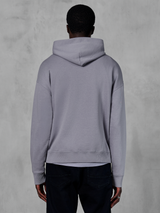 Alpinestars Essentials Ageless Hoodie, silvergrå fleece, vy bakifrån, minimalistisk pullover-design med huva och ribbade muddar, avslappnad motorsportinspirerad streetwear