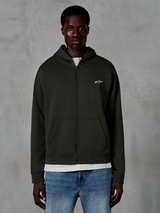 Alpinestars Essentials Ageless Zip Hoodie, huvtröja med dragkedja, Off Black, med en liten vit stjärnlogotyp på bröstet, framfickor och ribbade muddar, bärs som avslappnad motorsport-inspirerad streetwear