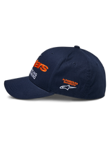 Alpinestars Entitled Hat, Side Profile, Navy Blue with Orange and White Embroidery, featuring 'Alpinestars Racewear' text and logo, curved bill, structured crown, casual motorsport headwear