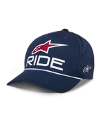 Alpinestars Ride Comp Snapback-keps, mörkblå baseballkeps, vit RIDE-text och röd stjärnlogotyp, böjd skärm med vitt flätat rep, vardaglig motorsportkeps