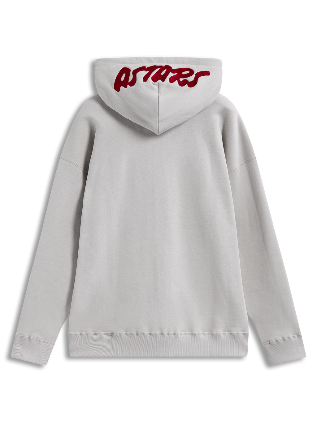 Alpinestars Pioneer Oversized huvtröja, sandfärgad sportswear-fleece med röd broderad Astars-logotyp på huvan.