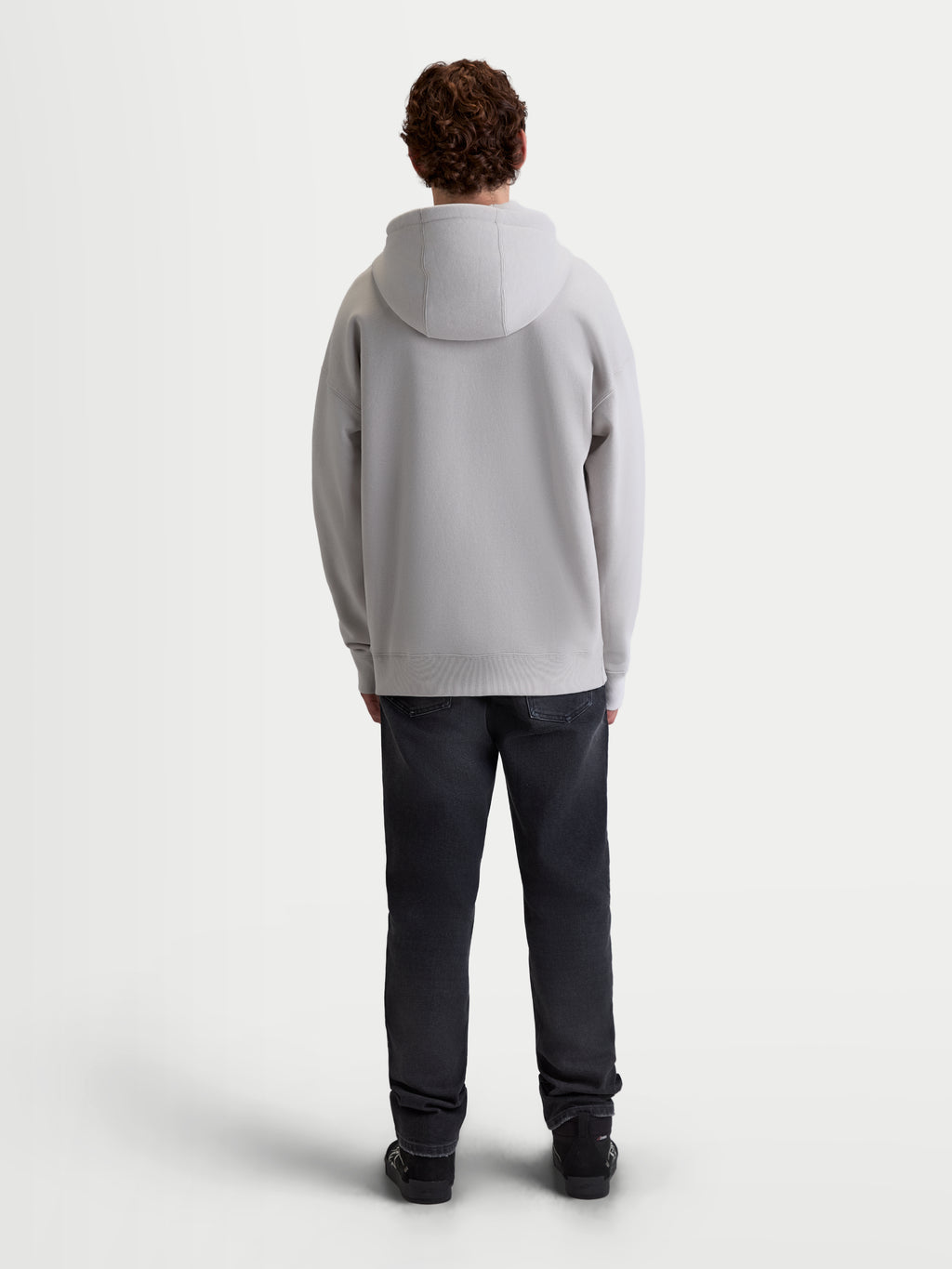 Alpinestars Entity Oversized huvtröja, cementgrå fleecehuvtröja för herrar, baksida som visar en avslappnad oversized passform, självfodrad huva och ribbade detaljer, premium livsstilsplagg.