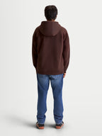 Alpinestars Entity Oversized huvtröja, brun huvtröja med dragkedja sedd bakifrån på modell, avslappnad oversized passform, premium bomullsblandning, avslappnade livsstilskläder.