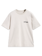 Alpinestars Latitude Oversized CSF Tee, beige kortärmad t-shirt med en svart Astars-logotyp på bröstet.