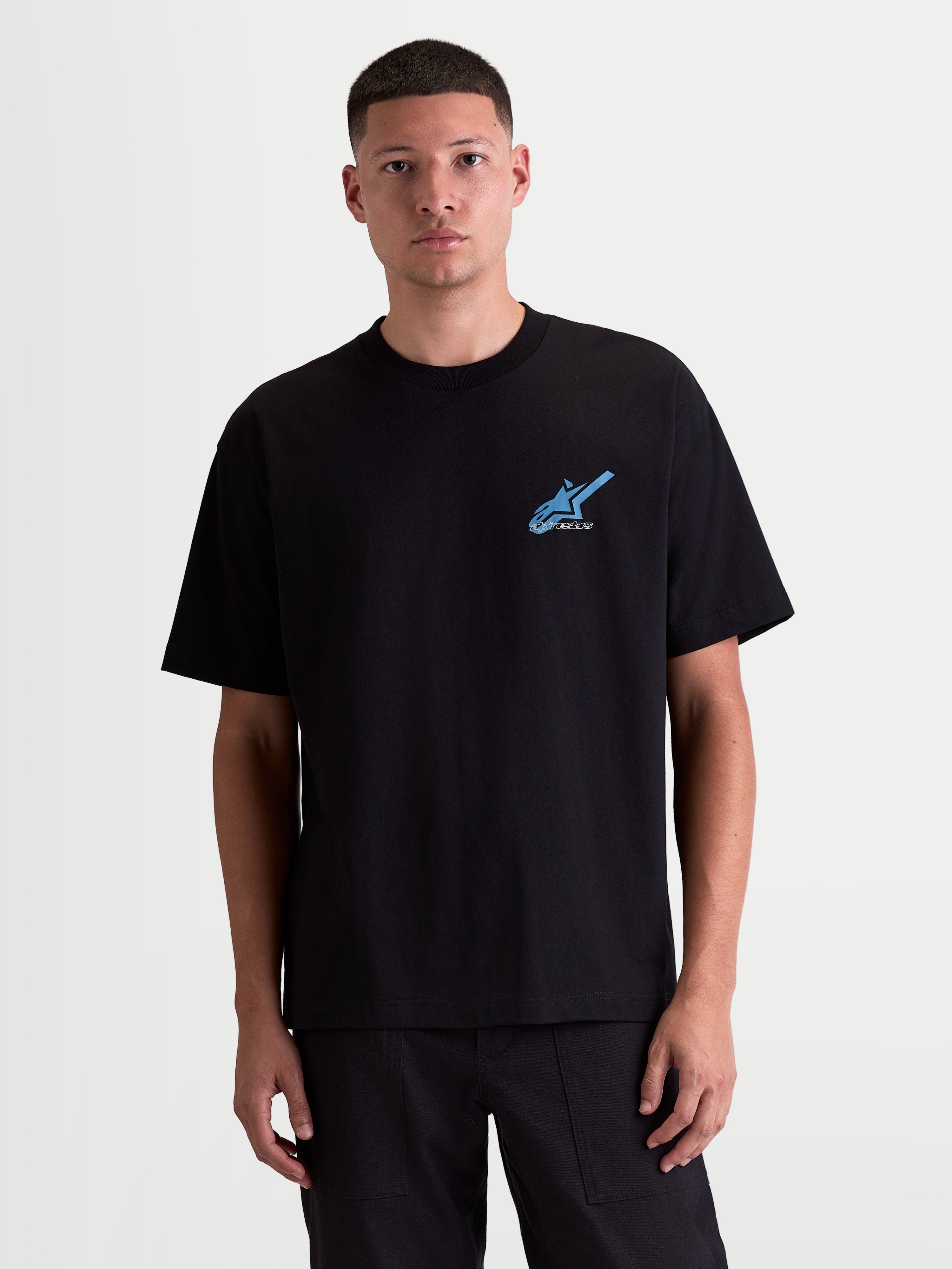 Alpinestars Ghost Oversized CSF t-shirt, kortärmad t-shirt för vardagsbruk, svart med blå Astars-logotyp på bröstet, oversized passform, mjuk bomullsblandning