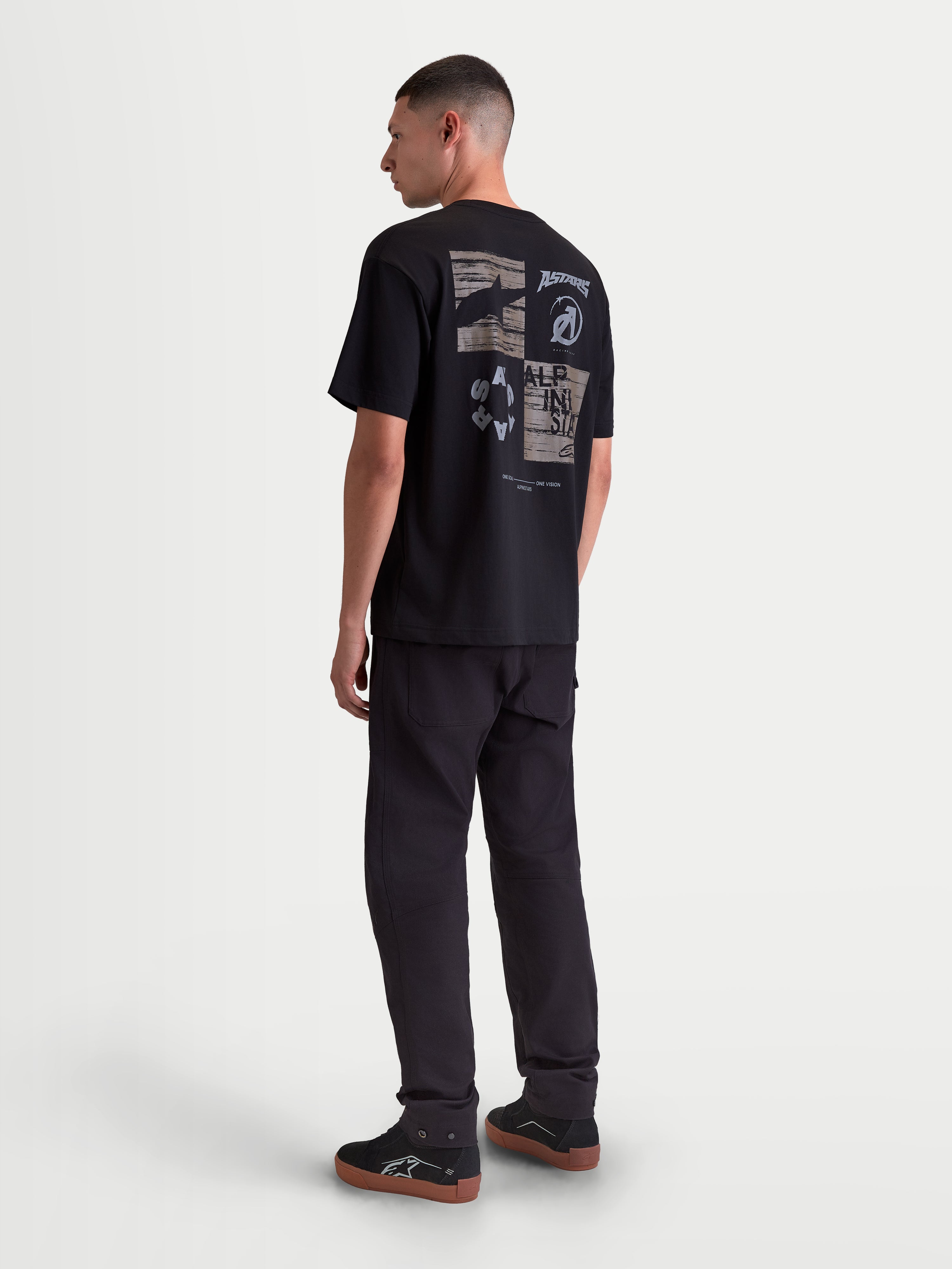 Alpinestars Checkback Oversized CSF Tee, Men's Sportswear Short Sleeve T-Shirt, Black with bold back checker graphic and Astars logo, relaxed oversized fit, motorsport-inspired lifestyle apparel.