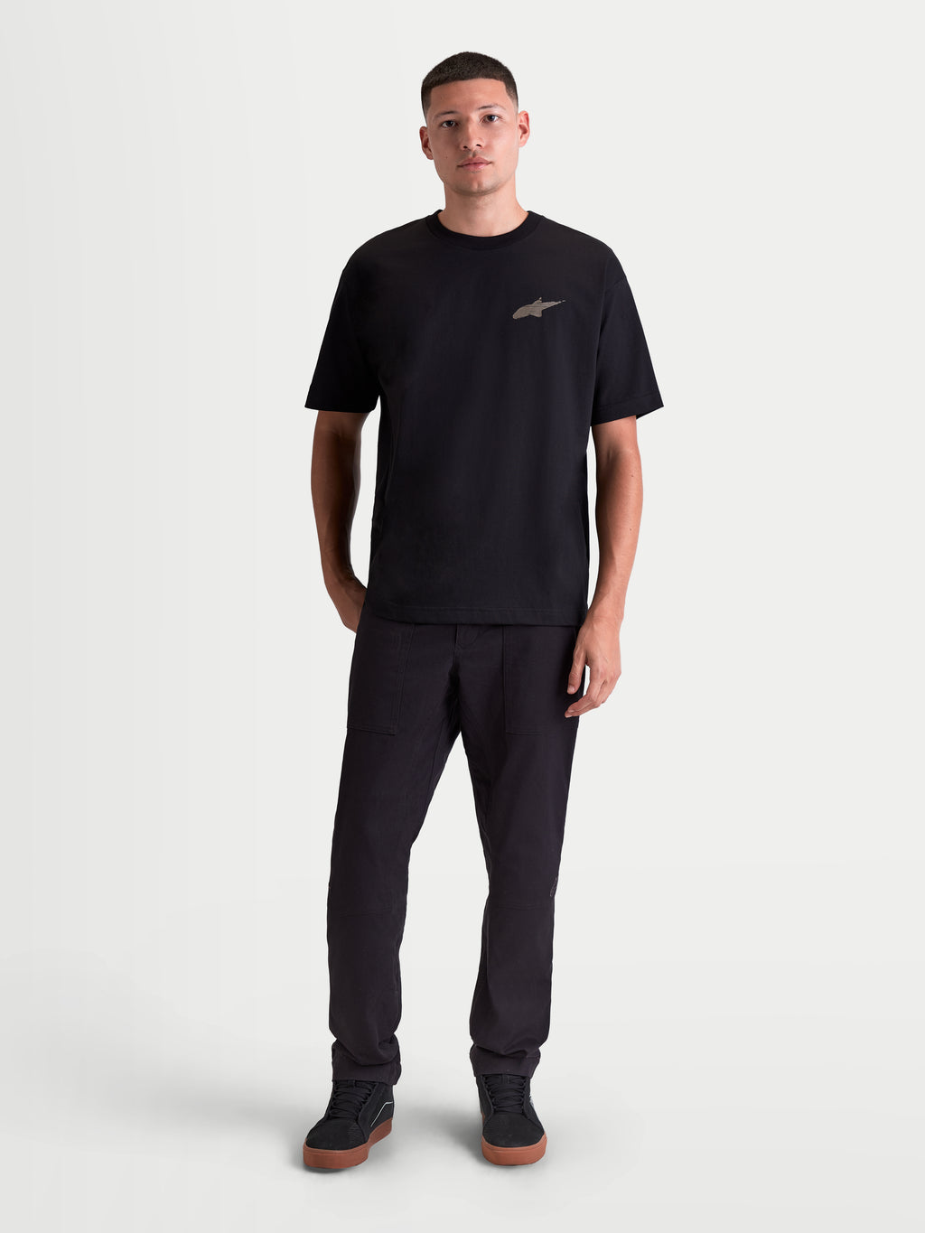 Alpinestars Checkback Oversized CSF Tee, Men's Short Sleeve Sportswear T-Shirt, Black, oversized relaxed fit with a front Astars logo, soft cotton-polyester blend material, casual motorsport-inspired lifestyle apparel, full-length on-model view.