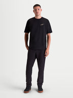 Alpinestars Checkback Oversized CSF Tee, Men's Short Sleeve Sportswear T-Shirt, Black, oversized relaxed fit with a front Astars logo, soft cotton-polyester blend material, casual motorsport-inspired lifestyle apparel, full-length on-model view.