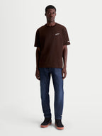 Alpinestars Mandate Oversized CSF t-shirt, kortärmad sportswear-t-shirt för herr, brun med vit pufftryckt Astars-logotyp, avslappnad oversized passform, bekväm bomullsblandning, livsstilskläder.