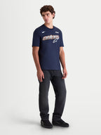 Alpinestars Cypress CSF Tee, Men's Short Sleeve Sportswear T-Shirt, Navy Blue, featuring a chest hit with a mesh-fill Astars word graphic and logo. Shown on a model for a casual look, this premium cotton-poly blend shirt is designed for daily comfort and motorsports lifestyle.