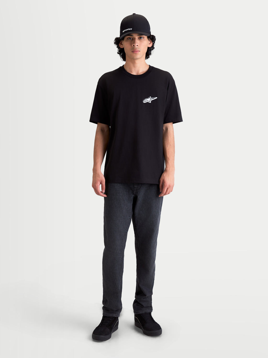 Alpinestars Meteor CSF Tee, Men's Short Sleeve Sportswear T-Shirt, Black with white Astars chest logo, premium cotton-poly blend, lifestyle on-model view.