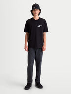 Alpinestars Meteor CSF Tee, Men's Short Sleeve Sportswear T-Shirt, Black with white Astars chest logo, premium cotton-poly blend, lifestyle on-model view.