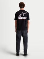 Alpinestars Lineout CSF t-shirt, kortärmad sportswear t-shirt för herrar, svart med stor vit Astars-logotyp och ”astars”-textgrafik på ryggen, visas på modell bakifrån, bomull-polyesterblandning.