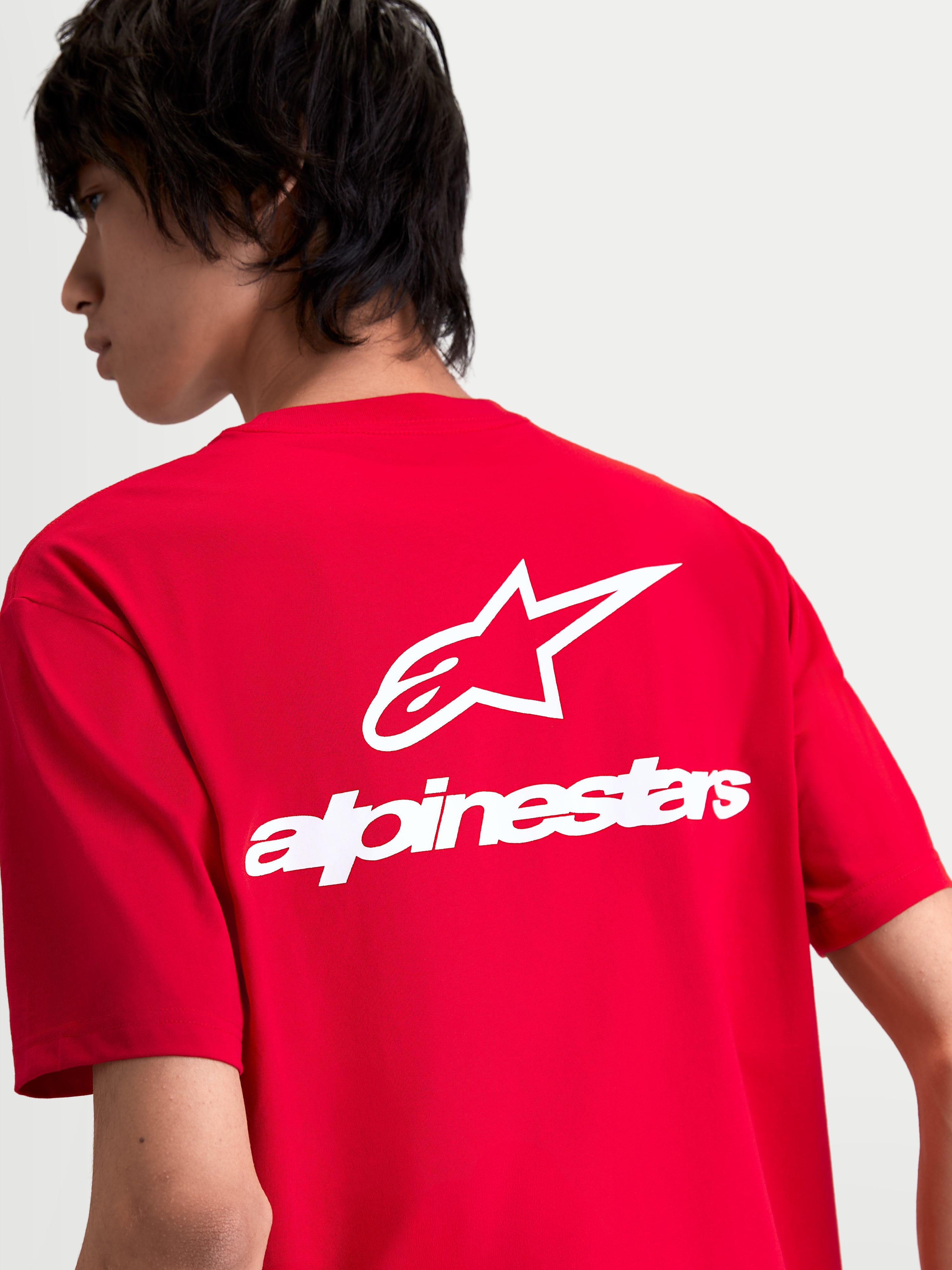 Alpinestars Combo Back CSF Tee, Sportswear Short Sleeve T-Shirt, Red and White, featuring a large white Astars logo and wordmark on the back, on-model view.