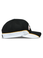 Alpinestars 500 Snapback keps, motorsport-inspirerad keps, svart och vit med orange detaljer, sidoprofil med böjd skärm, strukturerad krona och kontrasterande passpoal.