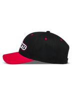 Alpinestars Retro Snapback keps, svart och röd sportkeps med böjd skärm och strukturerad krona i twill.