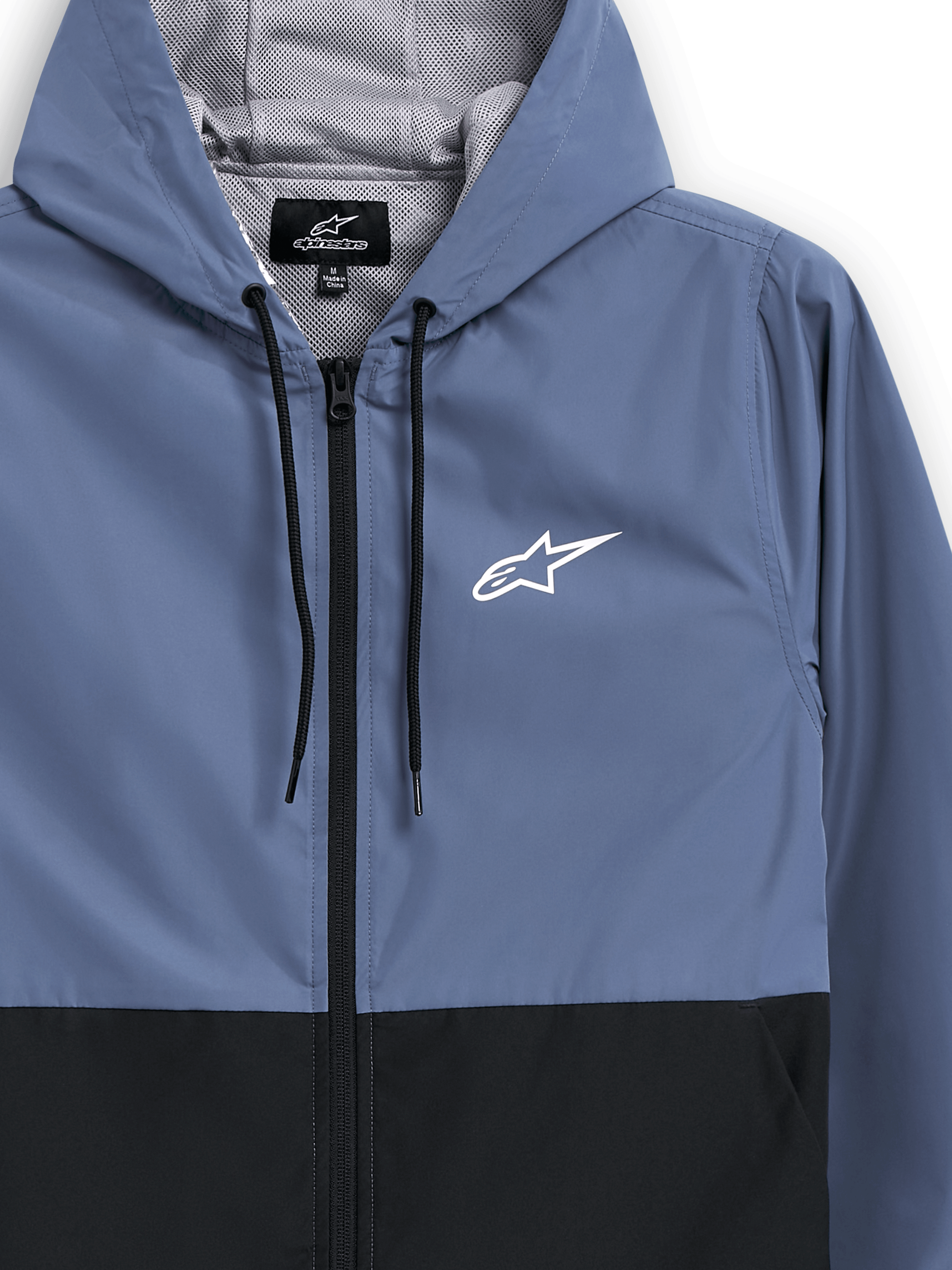 Alpinestars Speeder vindjacka, skifferblå och svart, lätt vindjacka med huva, meshfoder med svarta dragsnören, vit Alpinestars-stjärnlogotyp på bröstet, blockfärgad design, avslappnad motorsport-inspirerad streetwear