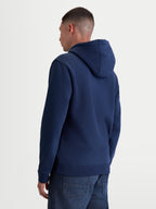 Alpinestars Ageless V3 huvtröja, mörkblå huvtröja i fleece för herr, bakifrån på modell, med ribbade muddar och fåll, premium bomull och återvunnen polyester