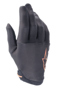 Alpinestars A-Aria Gloves, Mountain Bike (MTB) Gloves, Black with Rose Gold Star Logo, featuring a textured grid pattern on the fingers and lightweight stretch fabric for trail riding