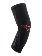 Alpinestars Paragon Plus knäskydd, svarta med röd Alpinestars-logotyp och text, ergonomisk slip-on-design, andningsbart mesh-tyg med förstärkta paneler, skyddsutrustning för mountainbike
