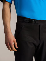 Black A-Dura Elite Flex Shorts for MTB, showing the front ratchet closure and zippered pocket in ripstop stretch fabric.