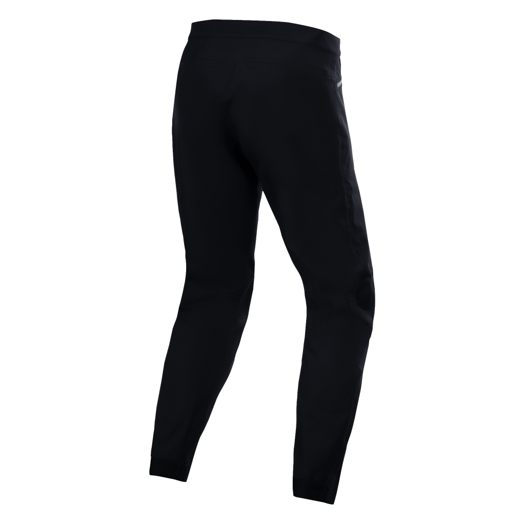 Alpinestars A-Dura Waterproof Pants, svarta, vy bakifrån som visar teknisk textilkonstruktion, mountainbikebyxor med 20k vattentäthetsklassning, hållbart stretchmaterial för terrängkörning i våta förhållanden