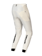 Alpinestars A-Aria Elite Pants, MTB-byxor, Ecru, baksida med tydlig svart Alpinestars-logotyp på underbenen, laserskurna ventilationshål och svarta elastiska muddar.