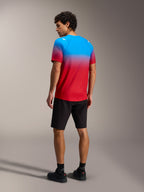 A-Dura ASTARS 2.0 Short Sleeve Jersey, Bright Red Blue gradient, back view on model, performance mountain bike gear.