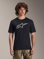 Alpinestars A-Dura Astar Jersey, kortärmad MTB-tröja, svart med vit stjärnlogotyp, bärs med kamouflagebyxor, lediga mountainbike-kläder, tekniskt fukttransporterande material
