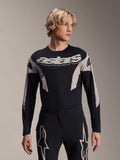 Alpinestars A-Supra Melt långärmad tröja, MTB-tröja, svart och grå, med 'astars'-grafik över bröstet och mönstrade ärmar, bärs med matchande funktionsbyxor
