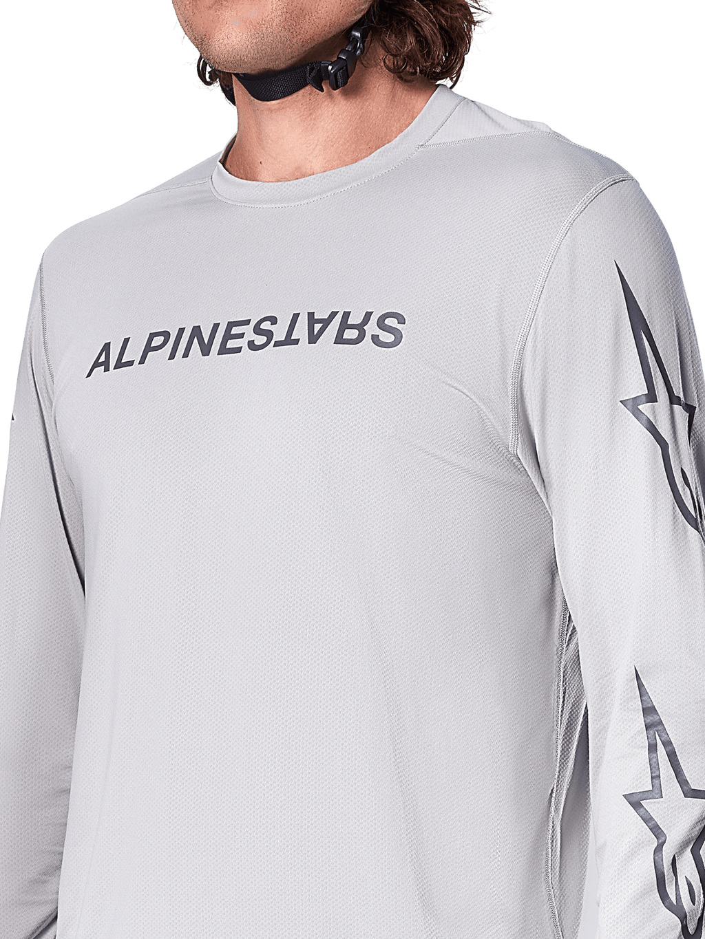 Alpinestars A-Dura Switch långärmad tröja, ljusgrå mountainbiketröja med mörkgrått ordmärke på bröstet och stjärnlogotyp på ärmen, ventilerande jacquard-textur, teknisk cykelutrustning för stigcykling