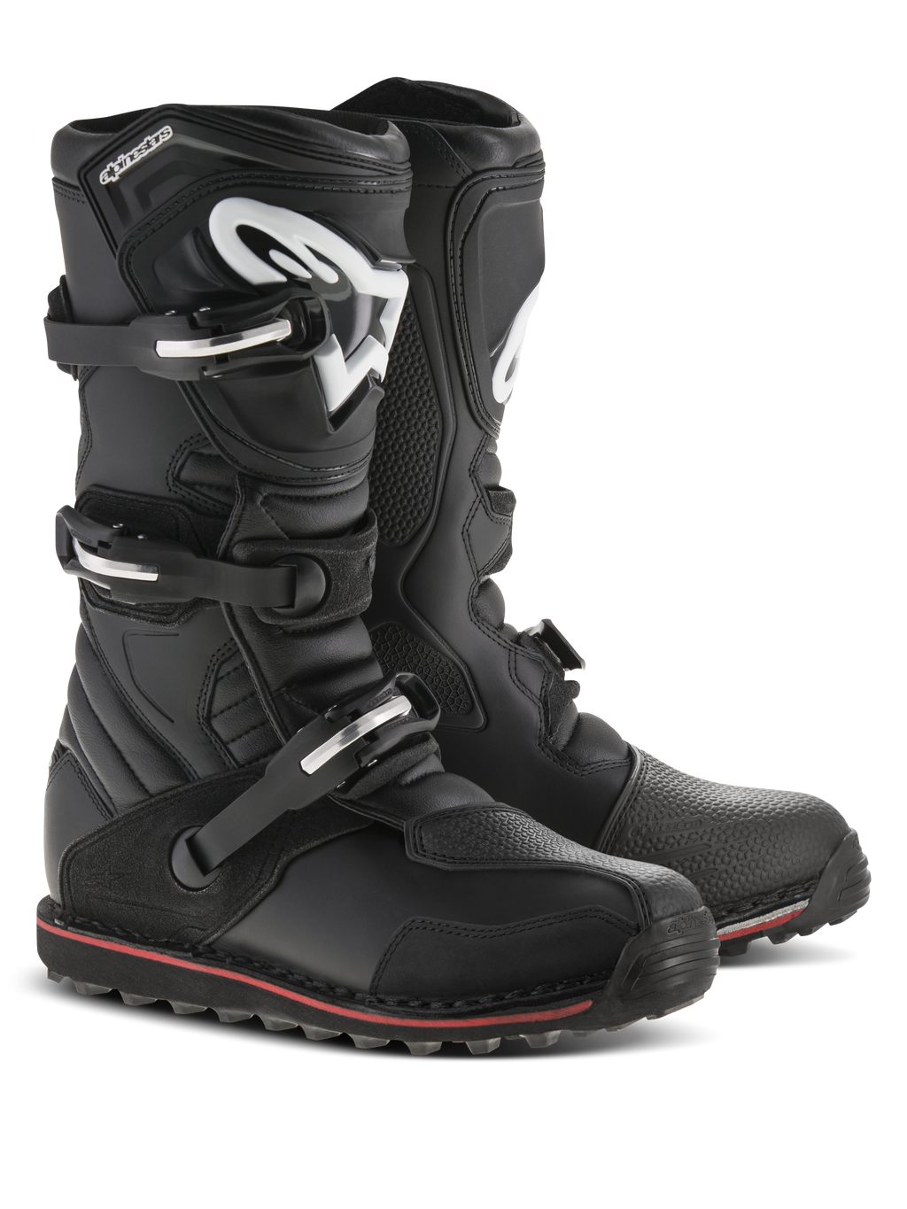 Alpinestars Tech-T stövlar, trialstövlar, svarta med röda och vita detaljer, stängningssystem med tre spännen, ergonomisk smalbensplatta med vit Astars-logotyp, smal röd rand längs sulan, hållbar läderkonstruktion för trials och terrängkörning