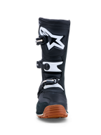 Alpinestars Tech-T stövlar, trials-motorcykelstövlar för herr, svarta och vita med gummifärgad sula, läderkonstruktion med TPU-skenbensplatta och spännessystem för optimalt grepp vid terrängkörning.
