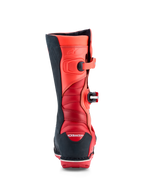 Alpinestars Tech-T stövlar, trialstövlar i röd fluo och svart läder, vy bakifrån med bakre dragspelszoner och CE-certifierat skydd för optimal flexibilitet och säkerhet.