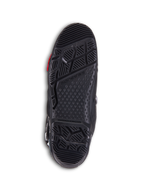 Alpinestars Tech 10 Enduro-stövlar, svarta motocross-stövlar, detaljerad vy av dubbelkomponentsulan med ett aggressivt mönster, Alpinestars-logotyp och utbytbar mittsektion för offroad-prestanda