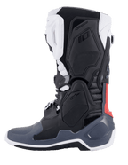 Alpinestars Tech 10 Supervented-stövlar, motocross-stövlar, svarta, vita, mellangrå och röda, profilvy från sidan, med ventilerade TPU-paneler, perforerad mikrofiberkonstruktion och högpresterande sula för terrängkörning