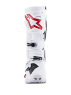 Alpinestars Tech 10 Supervented-stövlar, vita och klarröda, vy framifrån som visar ventilerade perforerade paneler, stor röd stjärnlogotyp på skenbensskyddet, justerbara silverspännen, högpresterande motocrossdesign