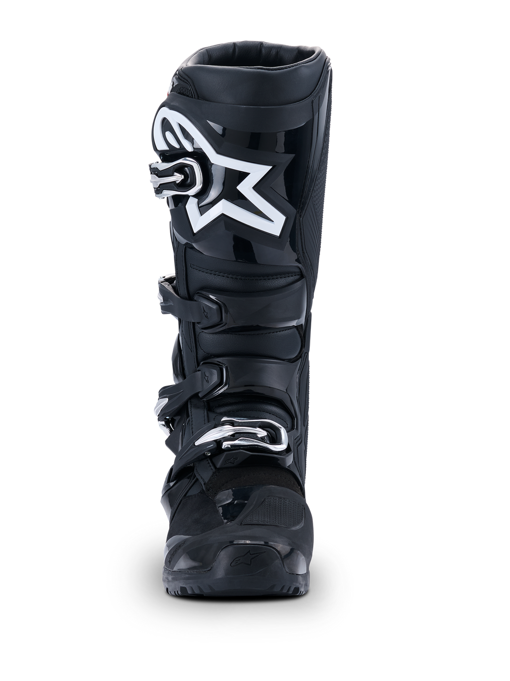 Alpinestars 2026 Tech 7 Enduro Drystar® stövlar, svarta motocross-stövlar, vy framifrån, med ett hållbart spännsystem med fyra spännen och en framträdande vit stjärnlogotyp på smalbenet, designade för off-road- och enduro-prestanda