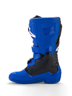 Alpinestars Yamaha Youth Tech 7S Boots, Youth Motocross Boots, Blue with Black and White accents, side profile view, featuring embossed 'Tech Series' branding, TPU protective panels, buckle closure system, and a durable blue sole for off-road performance.