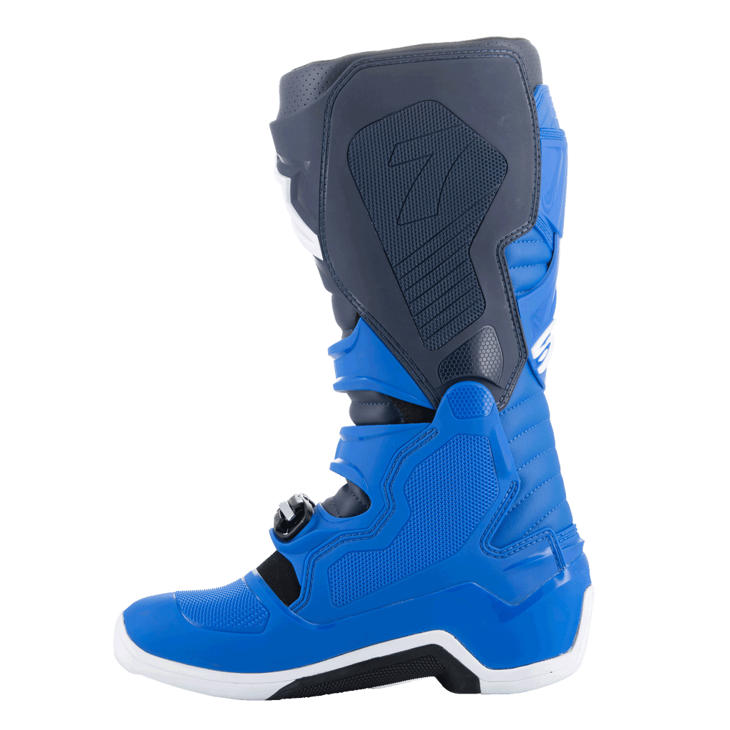 Alpinestars Tech 7-stövlar, motocross-stövlar, Alpine Blue, Night Navy och Bright Red, medial sidovy som visar skyddande TPU-paneler och förstärkt konstruktion för terrängkörning