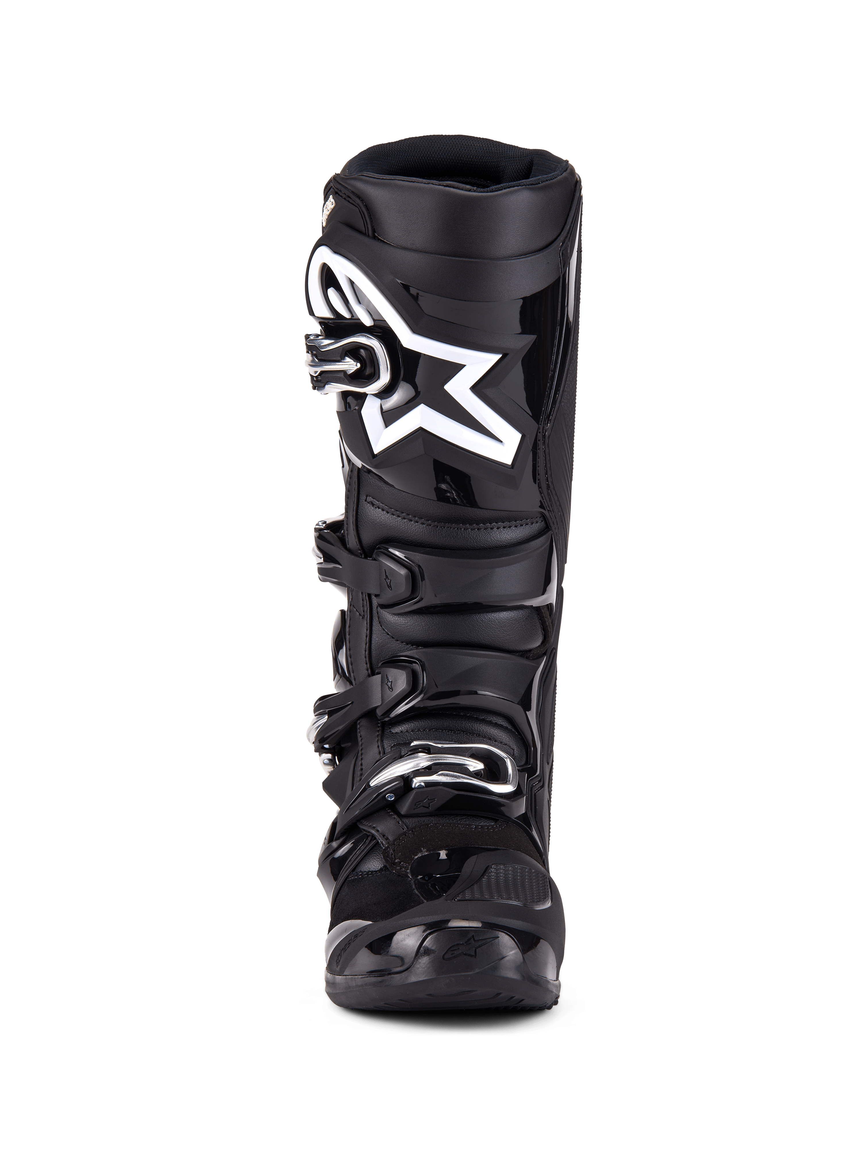 Alpinestars Tech 7-stövlar, motocross-stövlar, svarta, vy framifrån med stängningssystem med fyra spännen, framträdande vit Alpinestars-stjärnlogotyp på skenbensplattan, hållbart TPU-skal och förstärkt skydd för terrängkörning