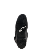 Alpinestars Tech 7-stövlar, vy av svart gummisula med vit Astar-logotyp, mönstrat greppmönster och röd slitageindikator för motocrossprestanda.