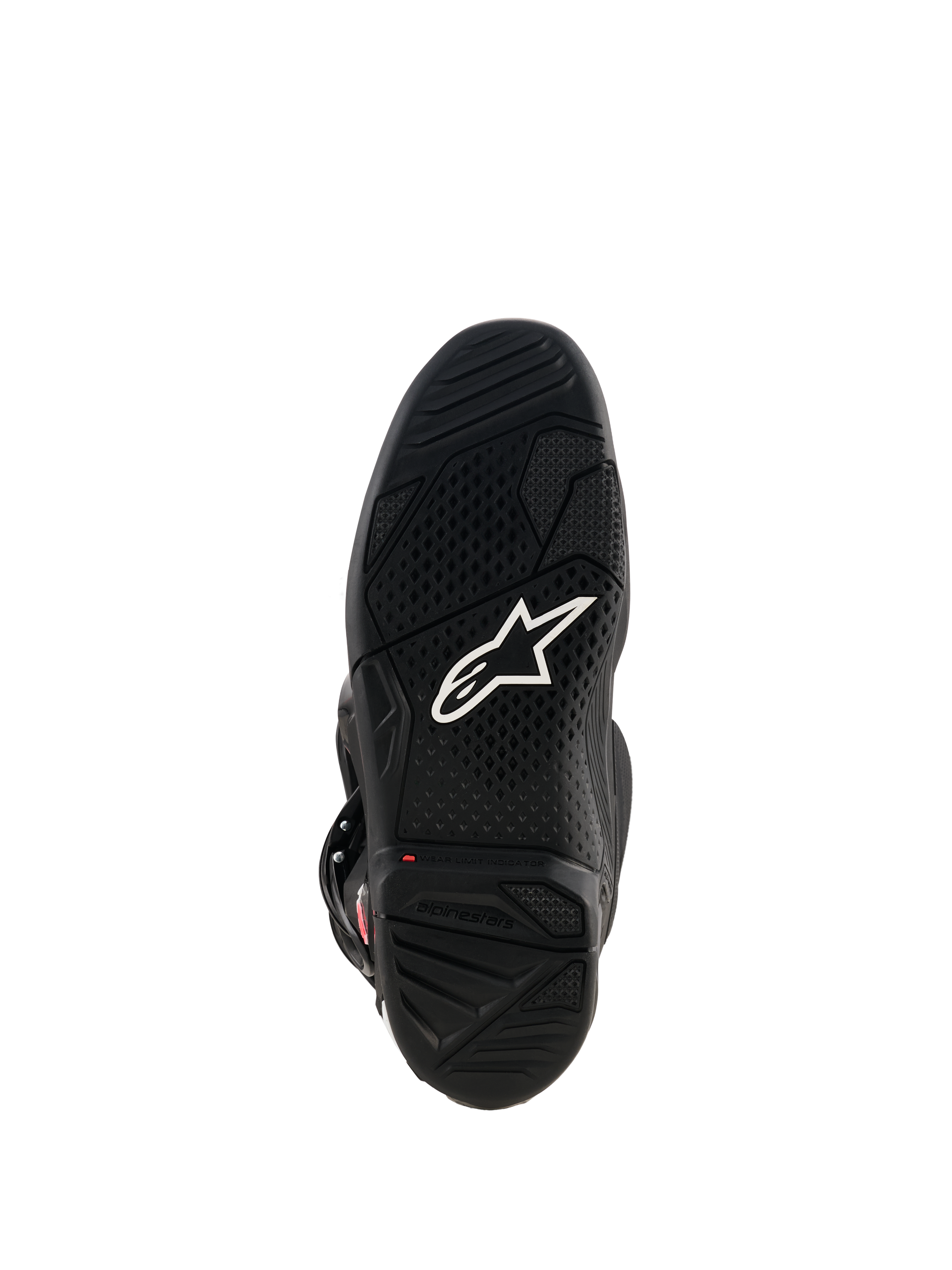 Alpinestars Tech 7-stövlar, vy av svart gummisula med vit Astar-logotyp, mönstrat greppmönster och röd slitageindikator för motocrossprestanda.
