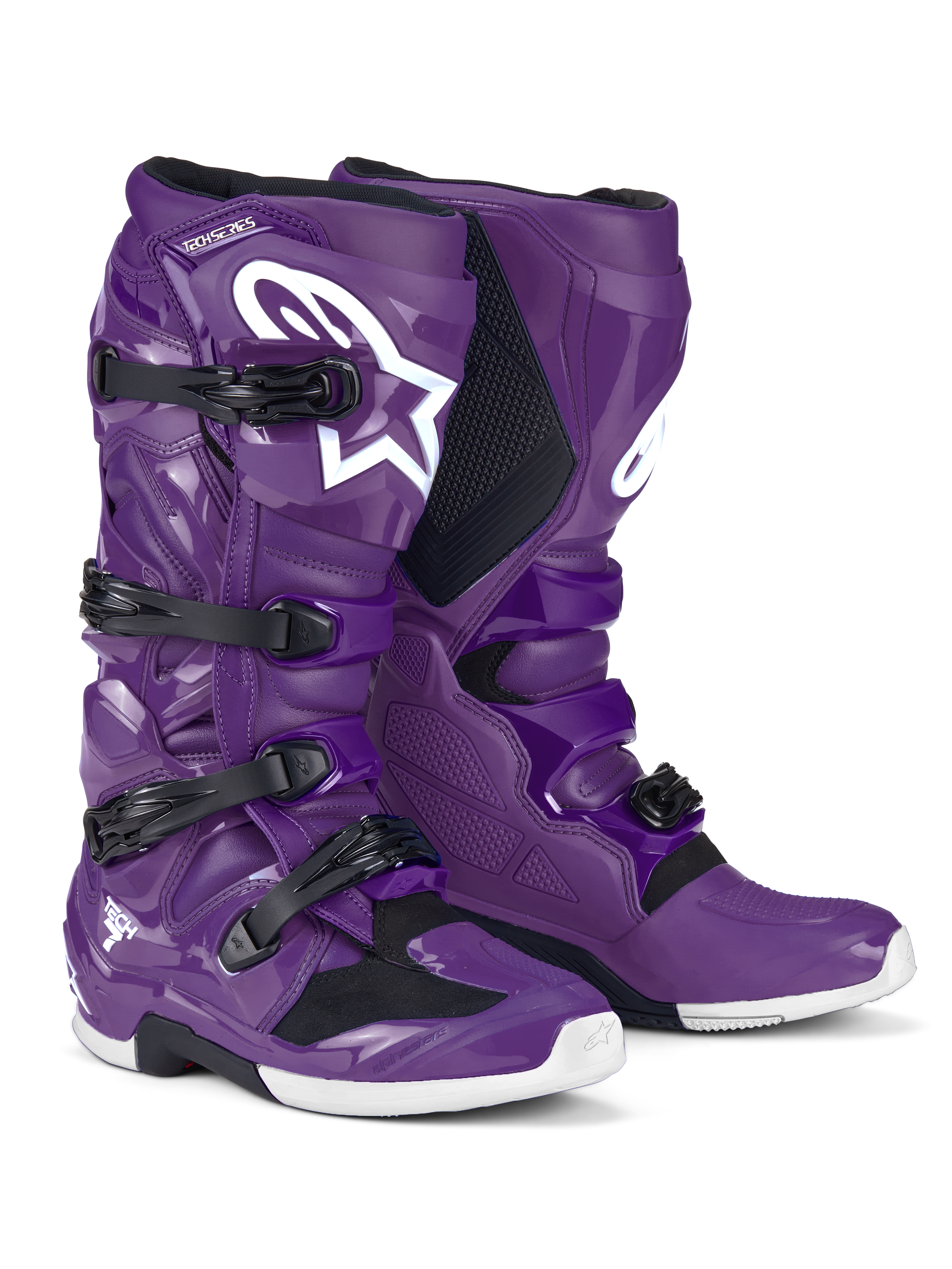 Alpinestars Tech 7 Boots, motocross-stövlar, lila med svarta spännen och en stor vit Astars-logotyp, högpresterande skyddande design med stängning via fyra remmar och hållbart TPU-skal för terrängkörning