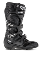 Alpinestars Tech 7 Enduro Boots, Black Motocross Boots, featuring four adjustable buckles and a reinforced TPU chassis, rugged lugged sole for off-road traction, white star logo and Tech 7 branding, durable high-performance footwear for enduro and dirt bike riding