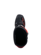Alpinestars Tech 7 Enduro-stövlar, svarta och röd fluo, vy uppifrån in i stövelöppningen, med svart innerfoder och röd stjärnlogotyp på framfoten