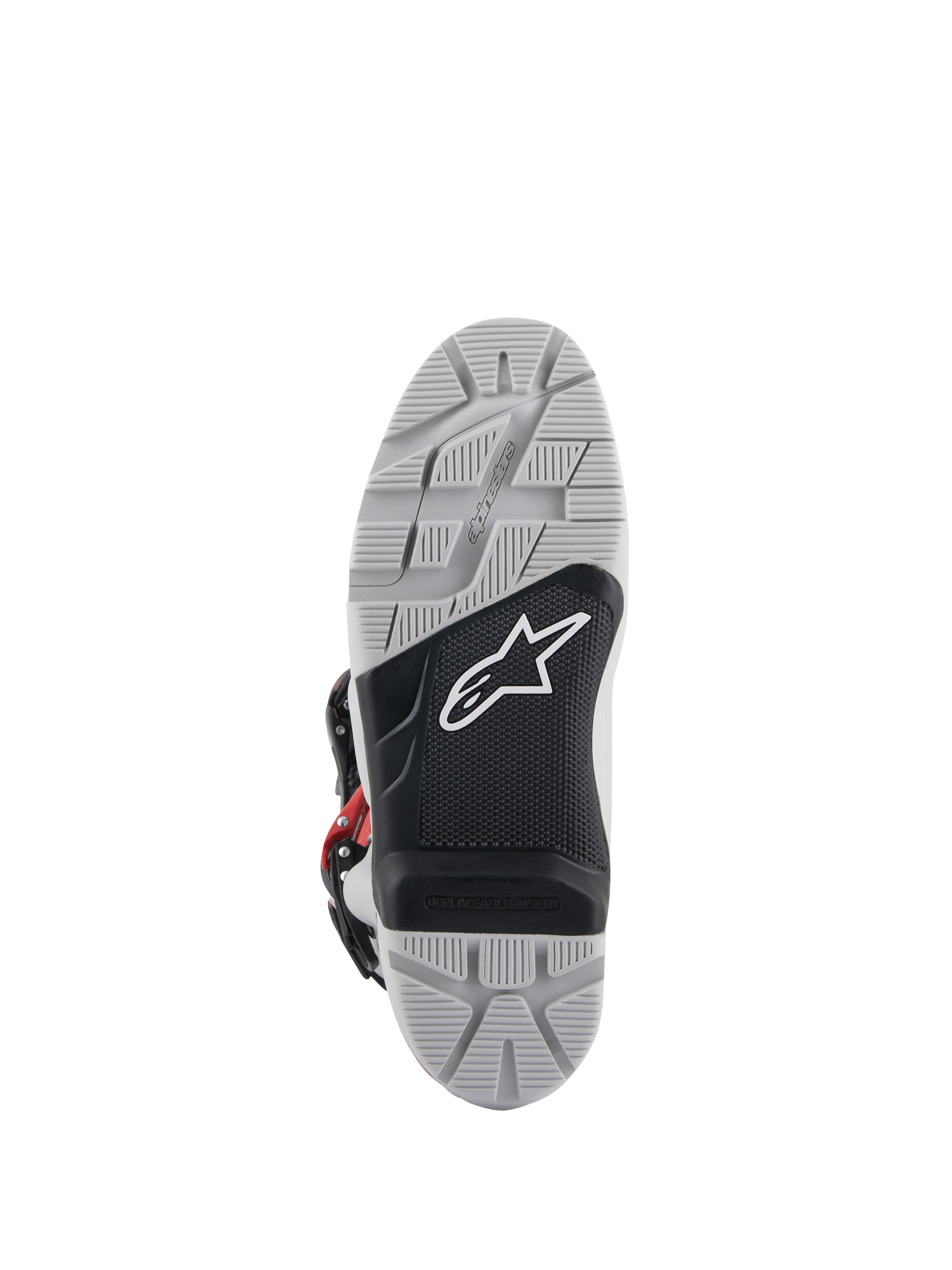 Alpinestars Tech 7 Enduro-stövlar, vy av yttersula, grå och svart dubbelsammansatt sula med vit stjärnlogotyp, djupt mönstrat sulmönster för maximalt terränggrepp, utbytbar fotpinnsinsats utformad för hållbarhet vid enduro- och terrängkörning